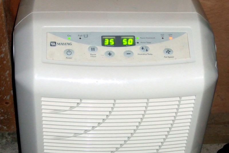 Household dehumidifier ready for use after water intrusion